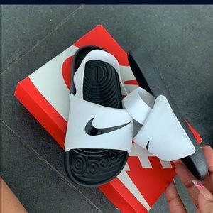 Toddlers size 8C Nike slides run kind of small